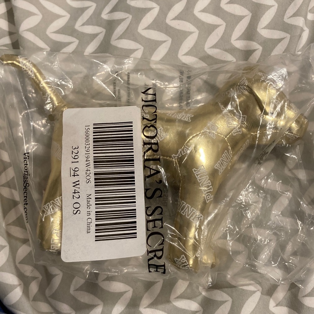 Victoria’s Secret gold dog
